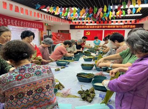 头堆社区开展关爱失独家庭 “我爱中国节，端午飘棕香” 包粽子-活动