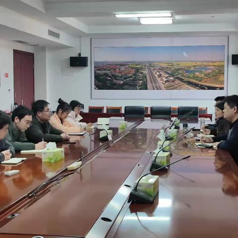 区招商局召开党支部会议暨局全体会议