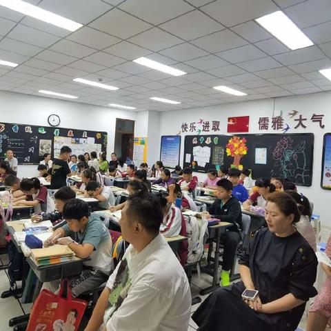 聚焦习作单元 共研教学策略——记北大附小海口学校六年级习作单元研讨活动