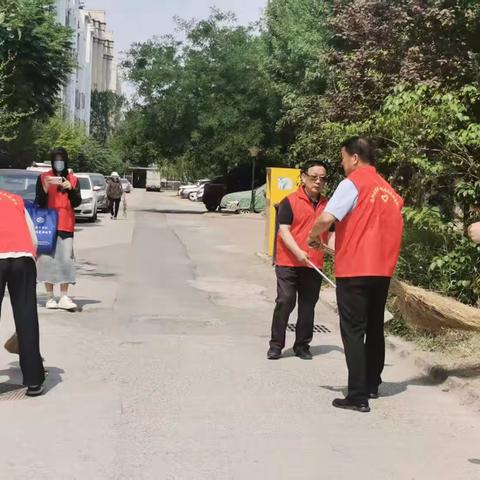 济北街道安康社区开展垃圾清扫志愿服务活动