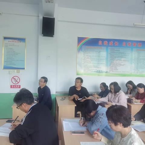 实验中学5月7日召开期中监测成绩分析会