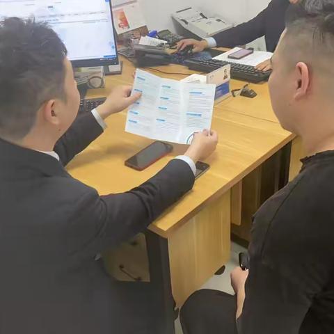 建行沙城支行开展拒收人民币，零钱包及反电诈宣传