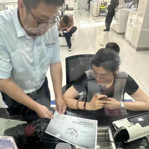 建行沙城支行不拒收人民币及零钱包宣传活动