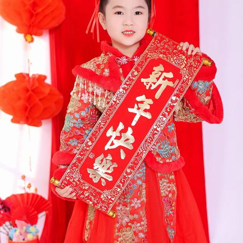 咔嚓！一起来拍照吧                                                 ——上蔡瑞吉欧爱乐幼儿园欢欢喜喜过新年主题活动