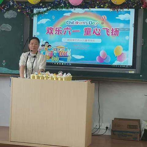 阳光.鲜花，五彩缤纷庆“六一” ——两院小学五（4）班庆“六一”活动        儋州市两院小学  谢海花