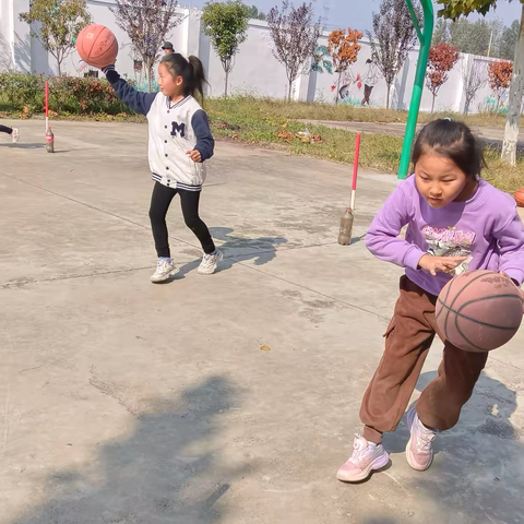 运动场上的呐喊声——龙山屯小学举行篮球🏀运球比赛