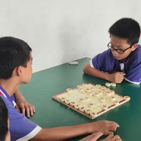 “象”互鼓励，“棋”乐融融，九龙学校初一象棋社团