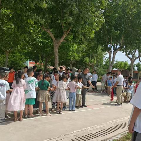 “拔河比赛展风采，凝心聚力向未来”—界河镇刘岗小学拔河比赛