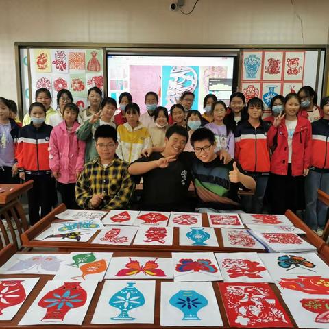 “妙剪生花—传承经典”大悟思源实验学校剪纸社团