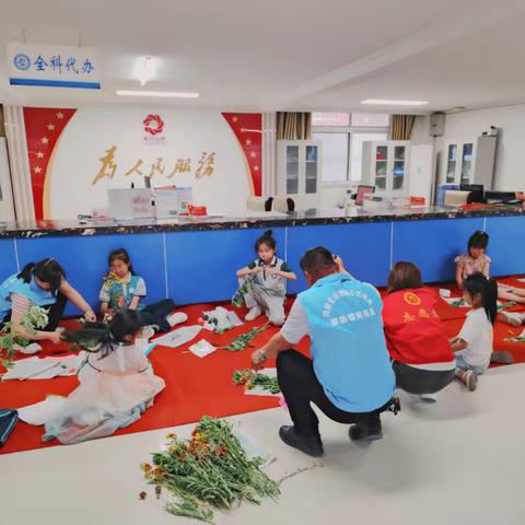 樊湾社区开展“艾香承古韵，童影绽新光”端午节志愿活动