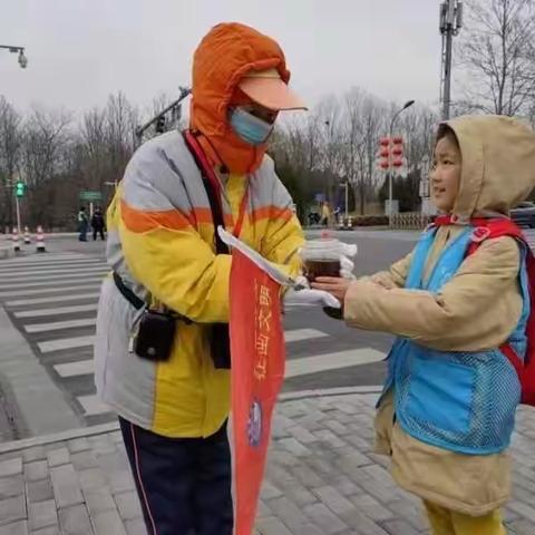 赏读 |二十四节气雨水之文明交通“雨”我“童”行志愿服务活动