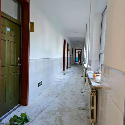 烈日下的“提质”答卷——滕州市柴里矿区学校小学部楼顶加固工程纪实