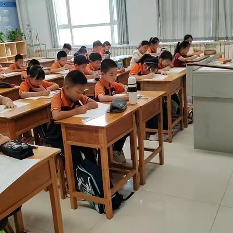 开学首考 扬帆起航——记北海一实四年级级部开学考