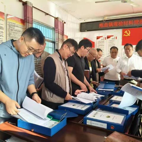 对标样板学经验 凝心聚力迎考核——抱由镇召开巩固脱贫攻坚成果迎检材料规范化学习观摩