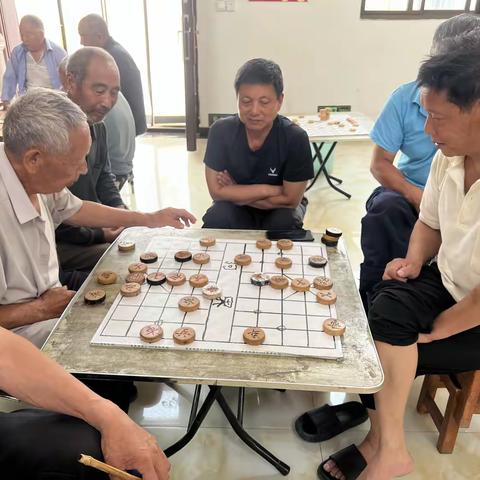 以棋会友展风采 以牌为媒暖人心