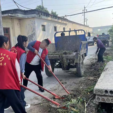 党员先行作表率   环境整治焕新颜