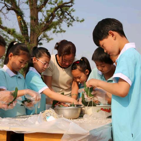 端午粽香童心颂 龙舟竞渡少年梦 ——吕家营学校端午系列活动