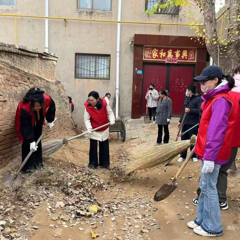 救助站全体党员干部进社区，助力环境卫生整治