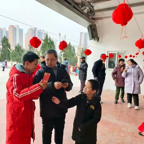 红旗街道汇丰路社区举办“猜灯谜 庆元宵”活动
