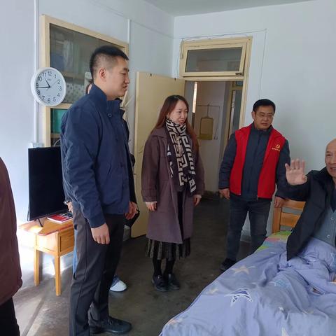 【碑林区张家村街道新时代文明实践站】暖冬行动进行时，爱心共筑帮扶路——红缨社区开展困难残疾人关爱慰问活动