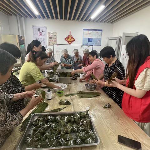 “浓情端午，欢乐粽享”——临港街道社工站开展包粽子手工实践活动