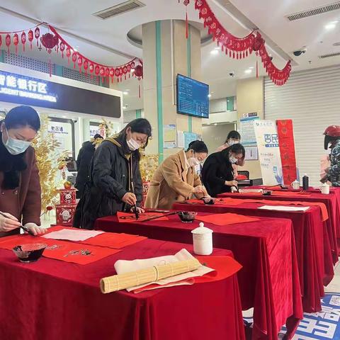 奉化支行分工会开展“迎新春 写春联 送祝福”活动