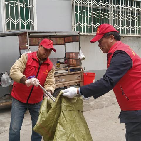 运城市退役军人服务中心帮建小区开展环境卫生整治提升志愿服务活动