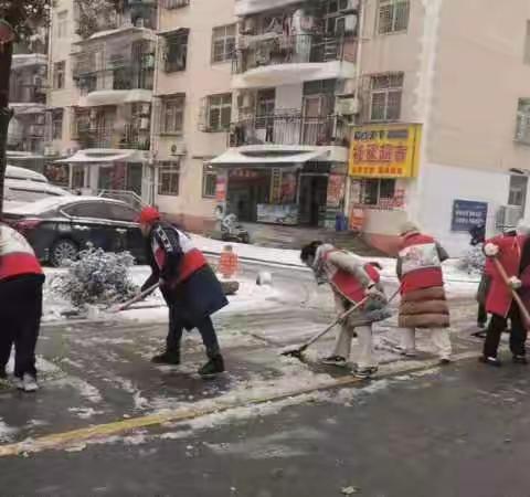 满城银装一夜来 扫雪除冰暖意浓