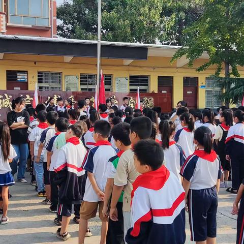 梦聚开学季，奋斗新学期——安丰乡木厂屯小学第一周升旗仪式