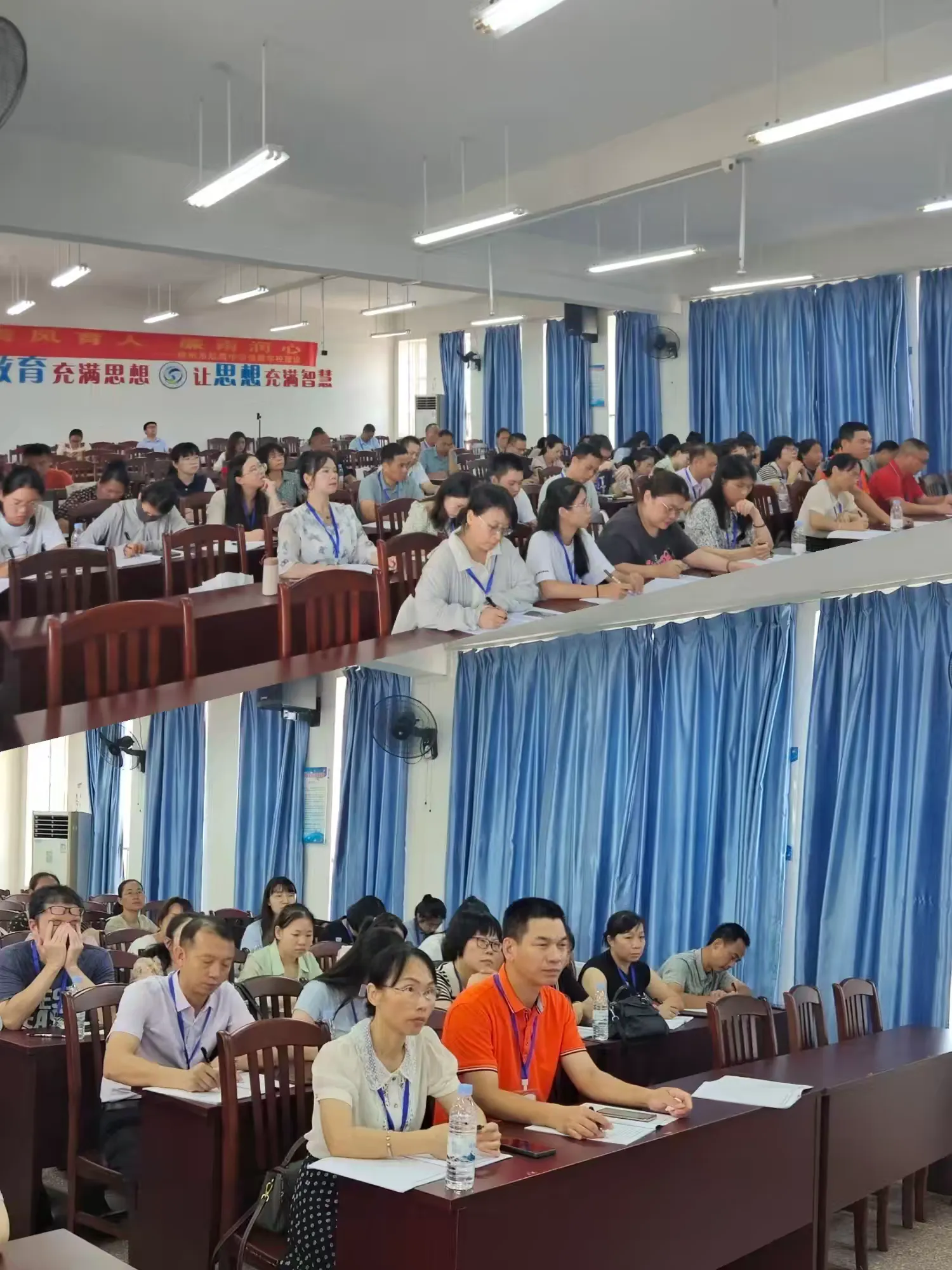 航鹰各科老师分享备考经验时,钦州港片区中学教师认真倾听并积极做