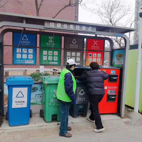 唐城小区开展垃圾分类宣传进商铺活动