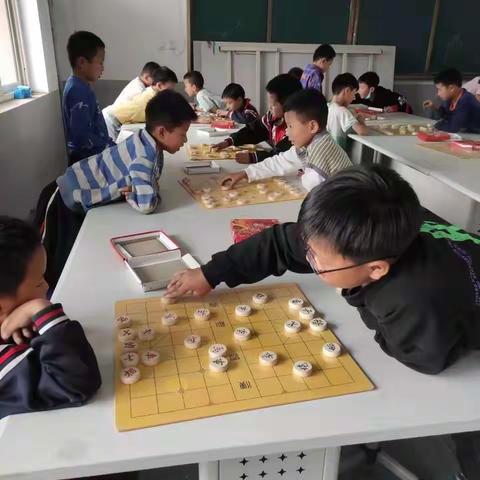 留村寺中心小学棋艺社团活动掠影