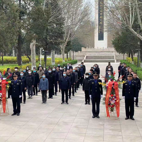 市城市管理综合行政执法局举行“传承红色基因  砥砺忠诚之心”向烈士敬献花篮活动