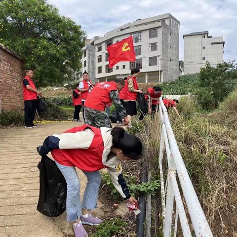 卧龙街道文昌社区开展“党建+河湖长”清河，共建绿美盘龙河活动