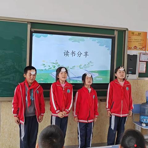 最美人间四月天  采撷书香润少年——那金镇中心小学三年组读书汇报会