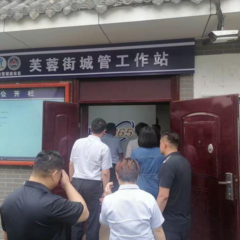 县城管局带队到济南学习考察城管进社区工作