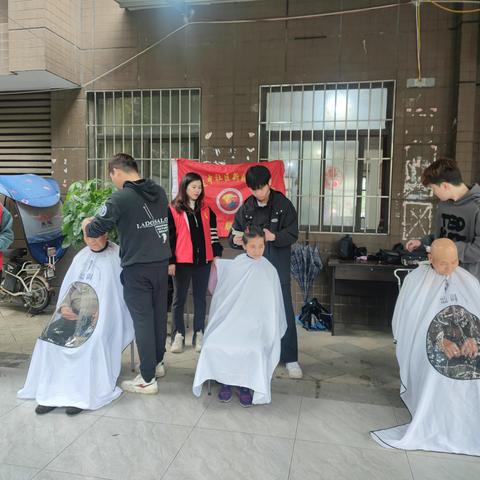 爱心义剪进社区  志愿服务暖人心