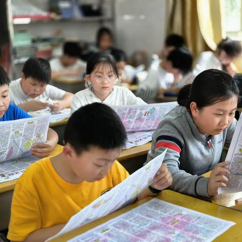 “悦”读时光 ——记广信区第五小学六（6）班读报课