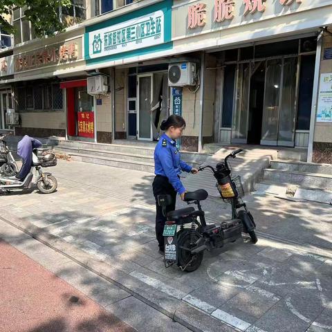 整治非机动车乱停放 提升城市市容秩序