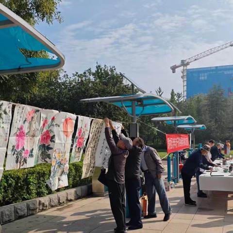 周村区老年老干部书画两会开展惠民活动
