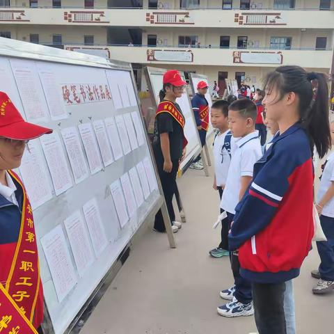 笔墨书丹心，纸间颂华章 ----子弟学校举办迎国庆书法作品展