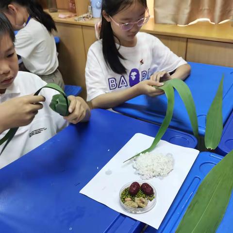 五彩丝线裹诗意，五（5）班端午粽香浓——许昌市毓秀路小学四（5）中队活动小记