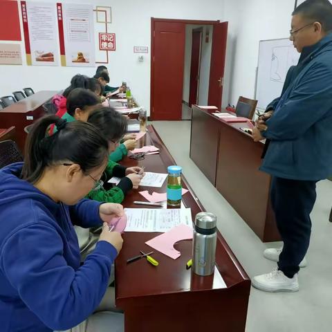 “文化暖冬行动”—济南社区科普大学馆驿街分校开展非遗剪纸展示活动