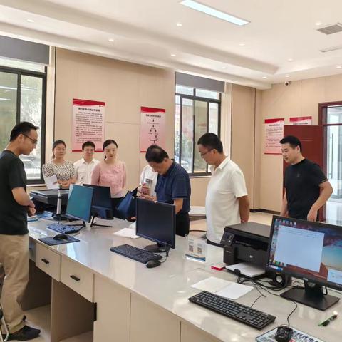 固始县档案馆 来商交流学习档案业务