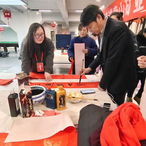 建国楼社区：墨香传福迎新春 社企共建暖人心​