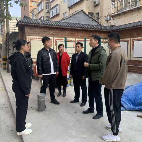 “双报到”单位历下区市政工程服务中心到趵突泉社区开展环境整治现场协调及志愿服务工作