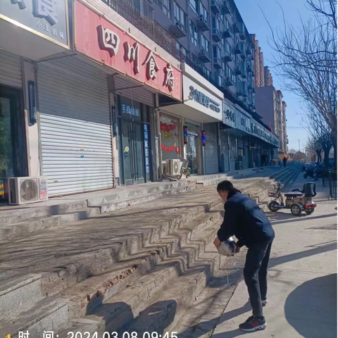 桥西区组织商户“门前三包”大扫除