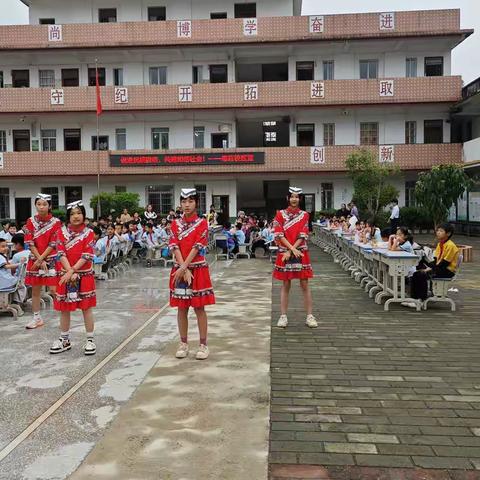 “广西三月三·法治伴你行”民族法治宣传暨“广西三月三，潮玩邀你来”缤纷活动在容县自良镇同江中心小学思旺校区举行