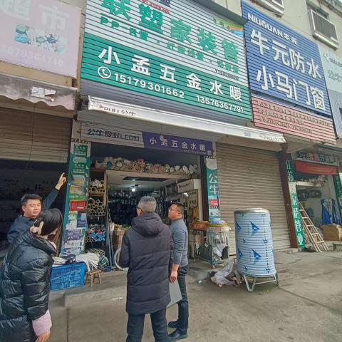 桃源街道信化社区开展“拆牌、破网、清通道”消防安全专项整治行动