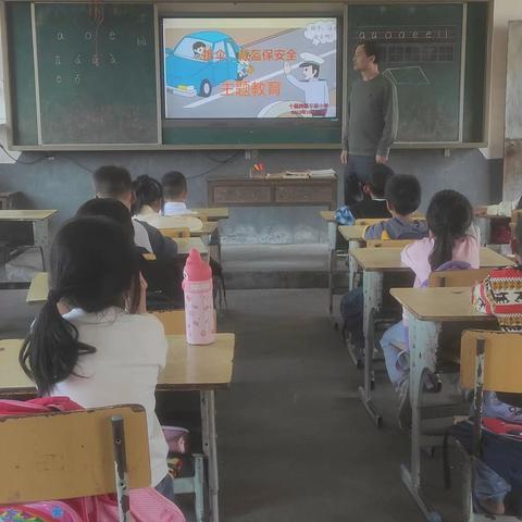 【十里岗镇丰源小学】拆伞戴盔保安全——道路交通安全主题教育活动纪实